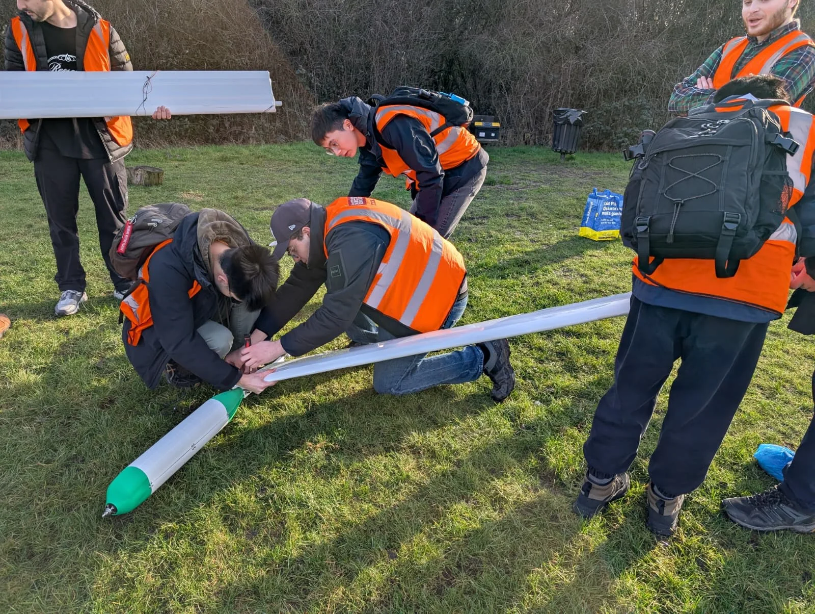 ICAV SPI students preparing the aircraft on the field before a flight test